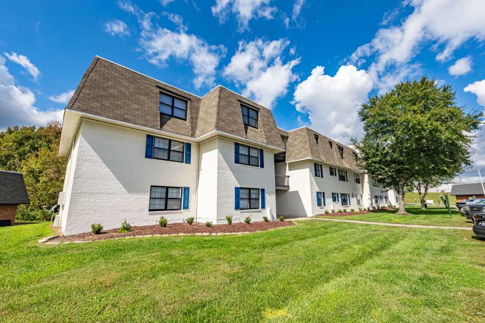 Lots of green lawn around the community at Huffman Mill Townhomes in Burlington, North Carolina,