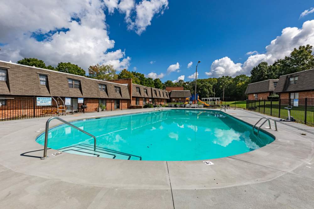 Resort-style swimming pool at Huffman Mill Townhomes in Burlington, North Carolina,
