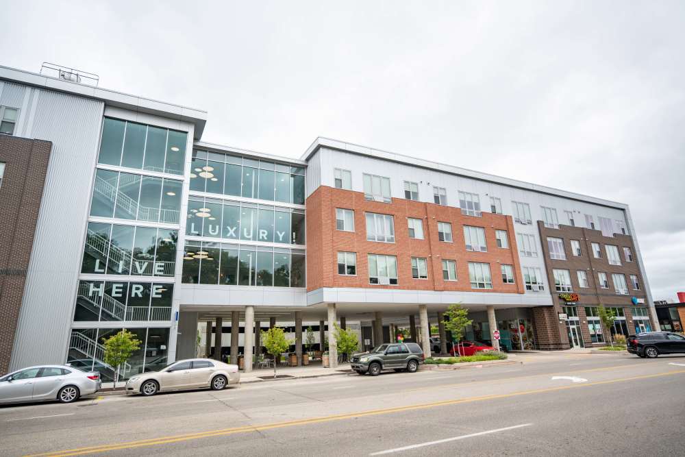 An apartment situated on a street corner, showcasing its prominent location in the urban landscape at Diamond Place I in Grand Rapids, Michigan