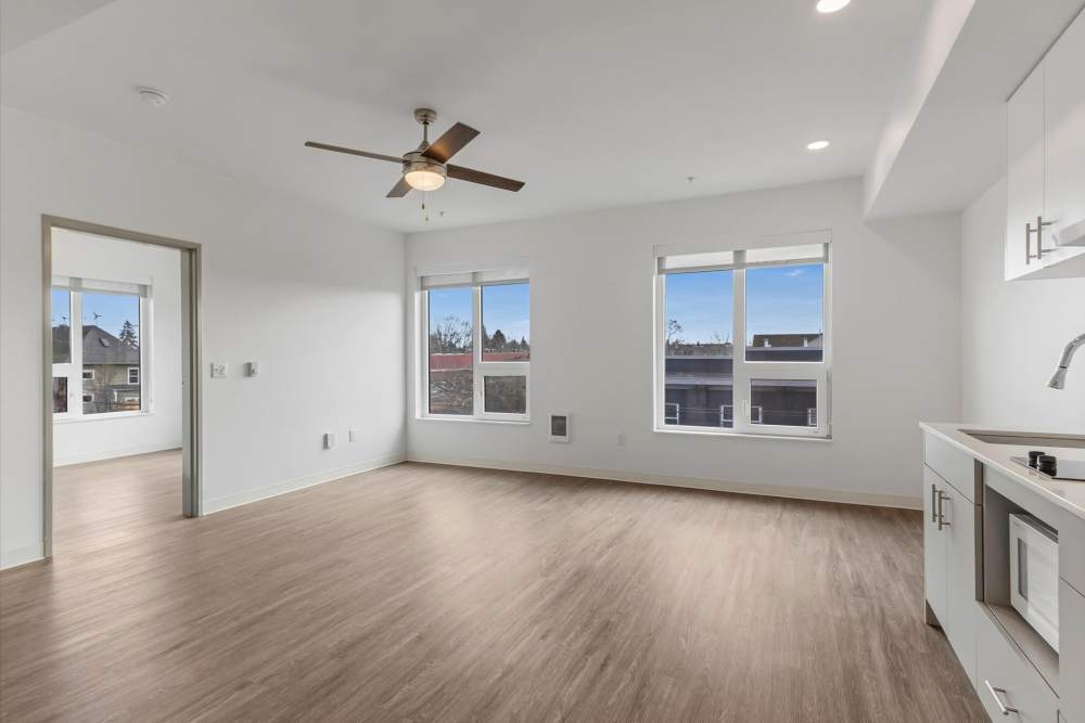 Spacious empty room with wood flooring at Koz on Killingsworth in Portland, Oregon