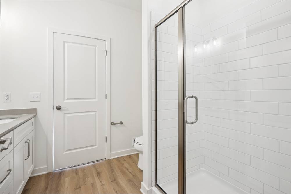 Bathroom with tiled shower at Hamlet Falling Creek in Midlothian, Virginia