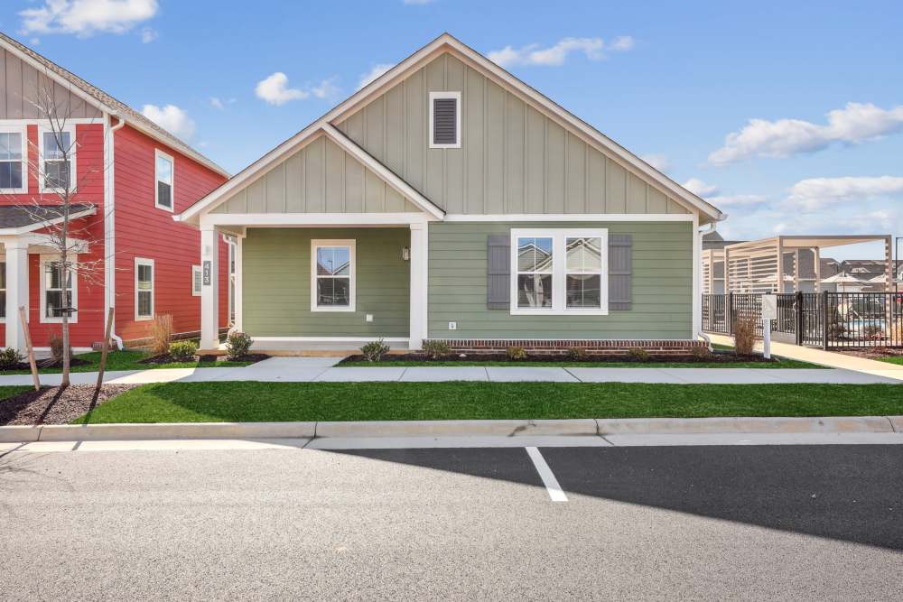 Exterior view of green home at Hamlet Falling Creek in Midlothian, Virginia