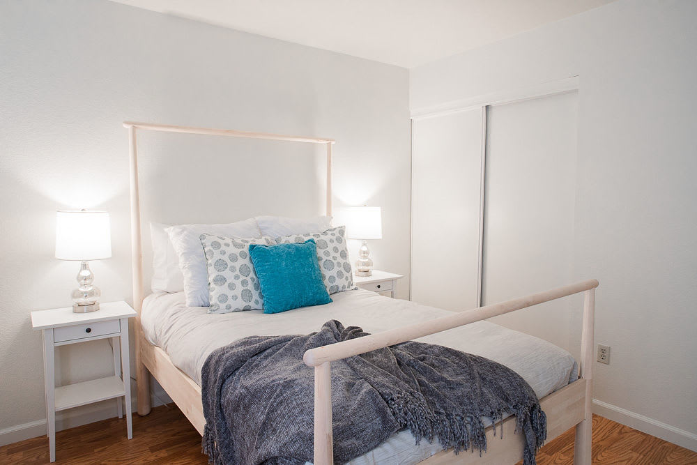 View of modern bedroom at Walnut Apartments in Santa Rosa, California