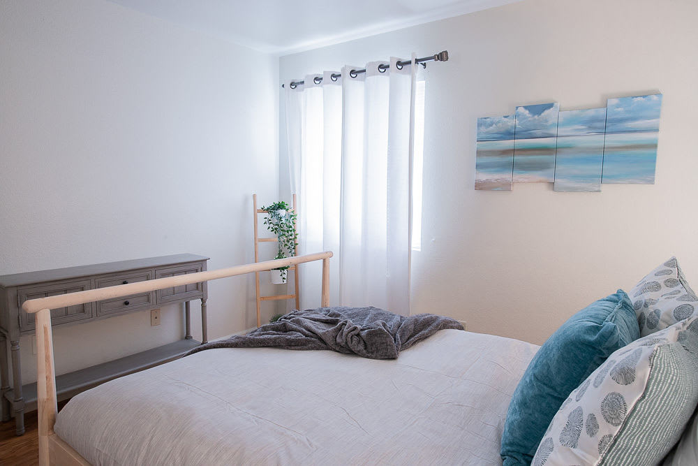 Bright bedroom at Walnut Apartments in Santa Rosa, California
