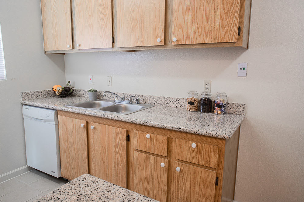 Kitchen with cabinetry at Walnut Apartments in Santa Rosa, California