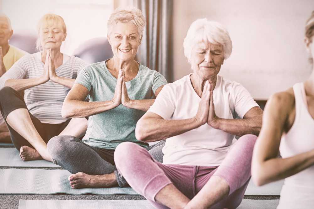 Relaxing yoga for residents of Keystone Place at Beachwalk in Fort Myers, Florida