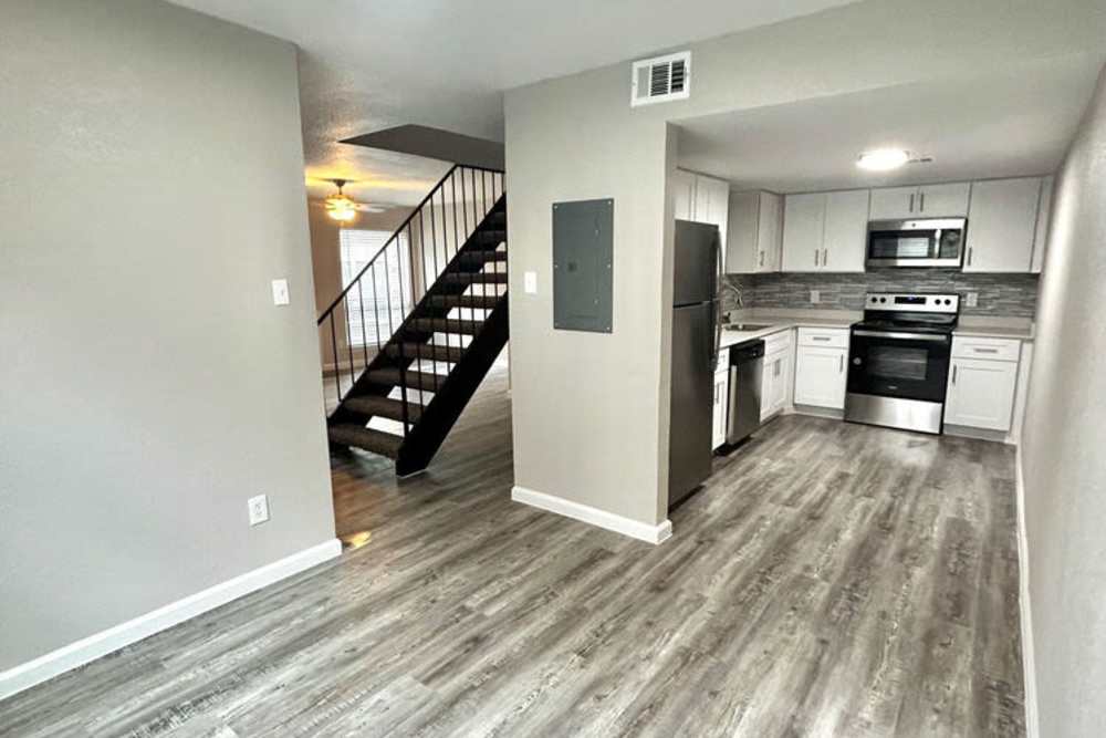 View of kitchen from living room at Athena Garden Apartments in Athens, Texas