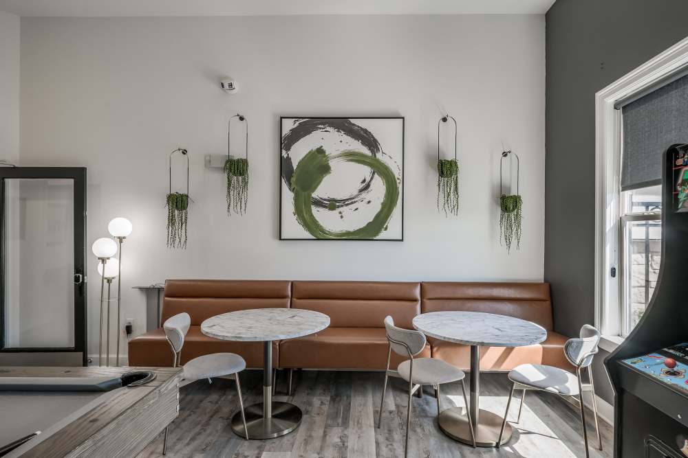 Recreation room with sofa at The Abbey at Park Lakes in Humble, Texas