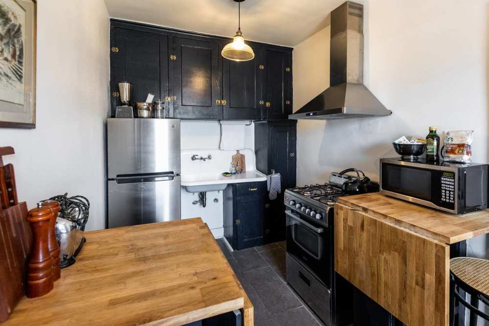 Fully-equipped kitchen at Detroit Living in Detroit, Michigan
