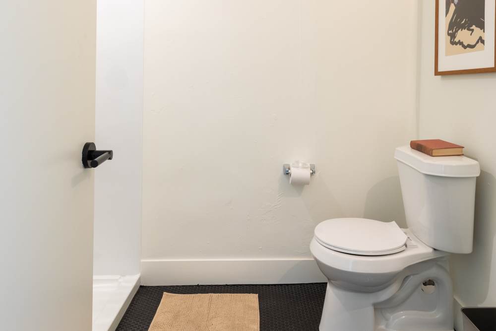 Bathroom with bright interiors and sanitary ware at Detroit Living in Detroit,Michigan
