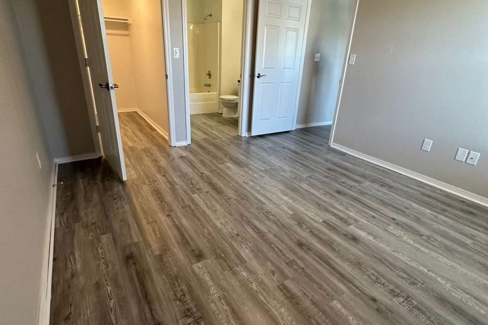 Bedroom with wood-style flooring at Garrett's Landing in Lawton, Oklahoma