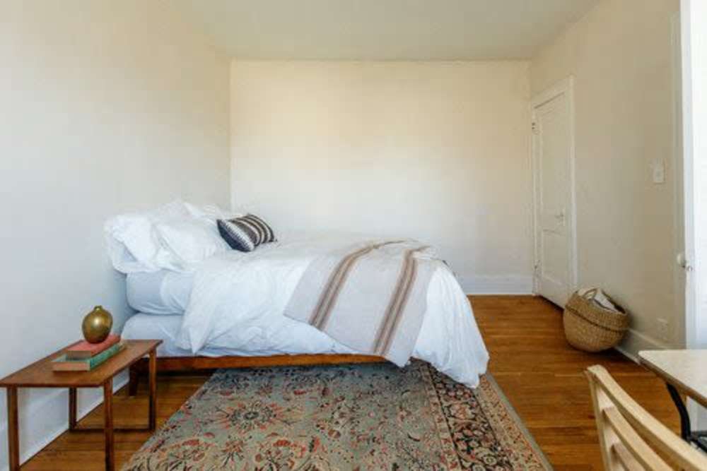 Cozy bedroom at Detroit Living in Detroit,Michigan