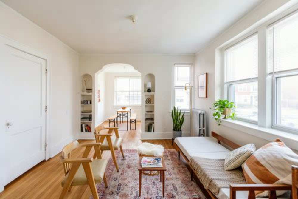 Ample amount of seating area in the living room at Detroit Living in Detroit,Michigan