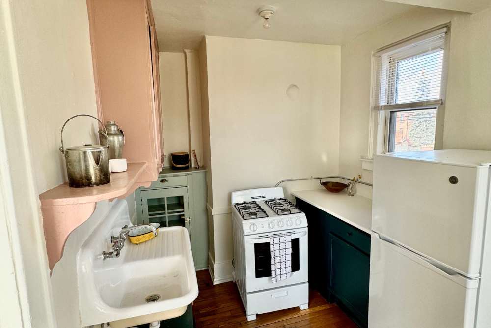 Apartment kitchen with trendy appliances at Detroit Living in Detroit,Michigan