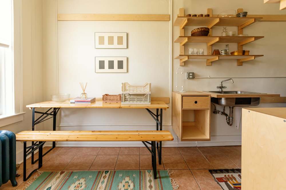 A compact kitchen with a table and a sink at Detroit Living in Detroit,Michigan