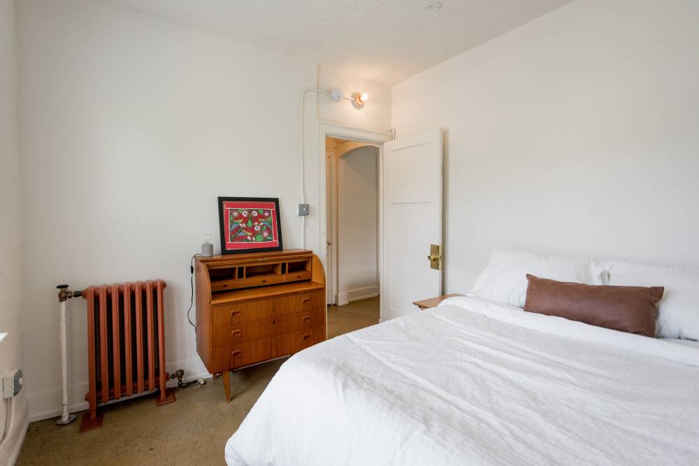 Model bedroom at Detroit Living in Detroit, 