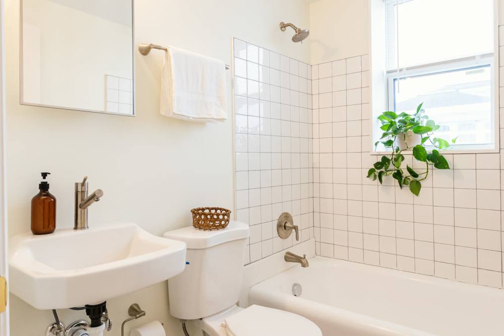 Bright bathroom with a vanity unit at Detroit Living in Detroit,Michigan