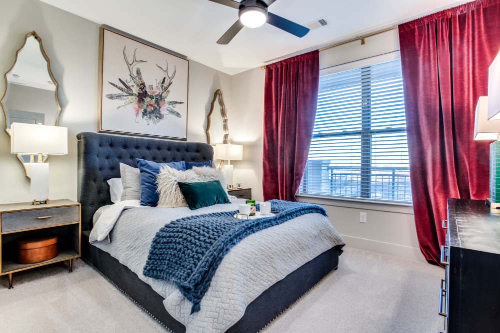 Bedroom with wide window at Vance at Bishop Union in Dallas, Texas
