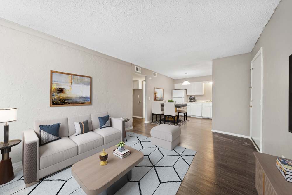 Spacious living room with hardwood flooring at Cypress Point Apartments in Shawnee, Oklahoma