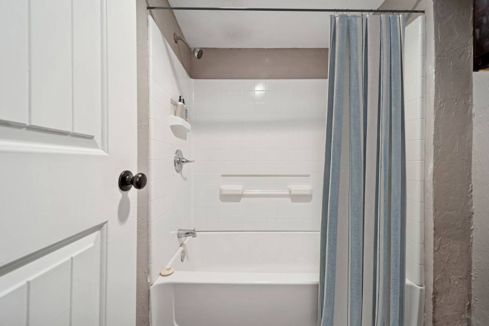 Curtained bathtub at Vintage At 50th in Oklahoma City, Oklahoma