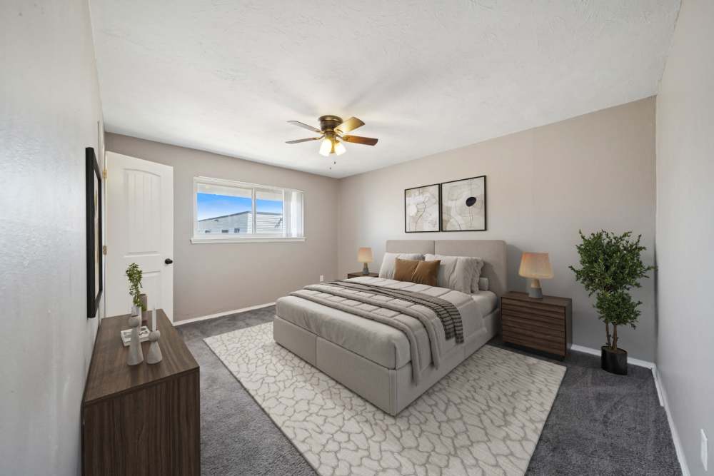 Spacious bedroom with two bed side table and two lamps at Vintage At 50th in Oklahoma City, Oklahoma
