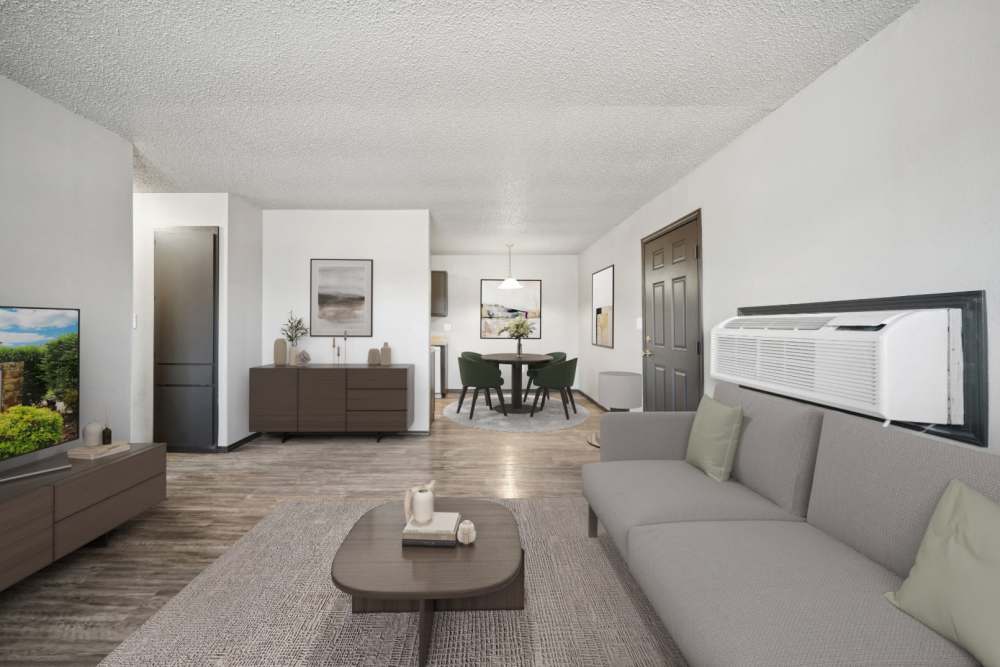 Living room area showcasing the dining table and cabinets at Sherwood Pointe Apartments in Shawnee, Oklahoma