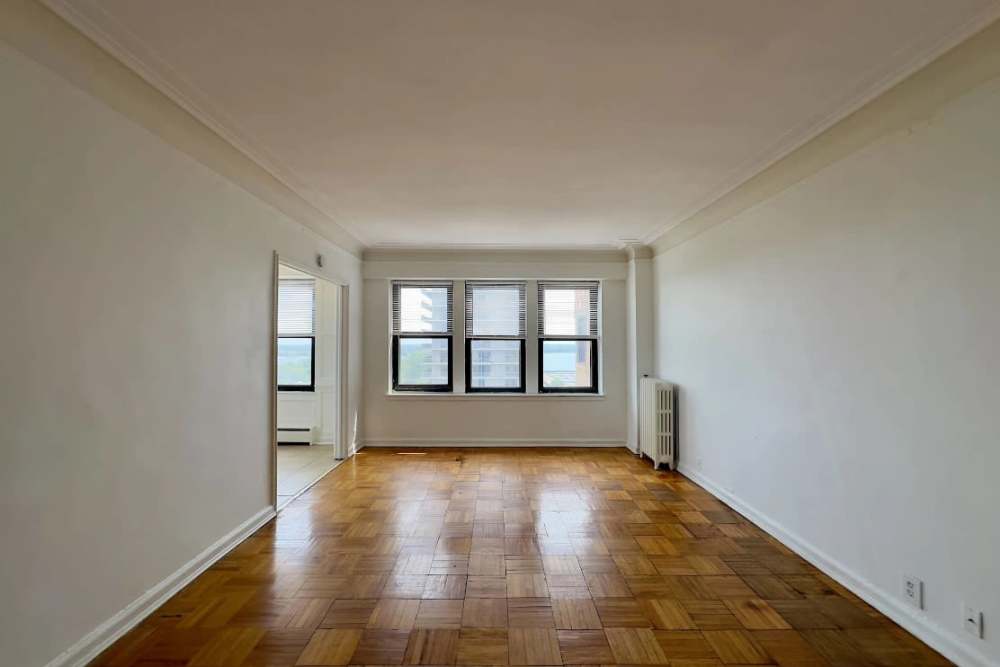 Spacious unfurnished living room with windows at Detroit Living in Detroit,Michigan