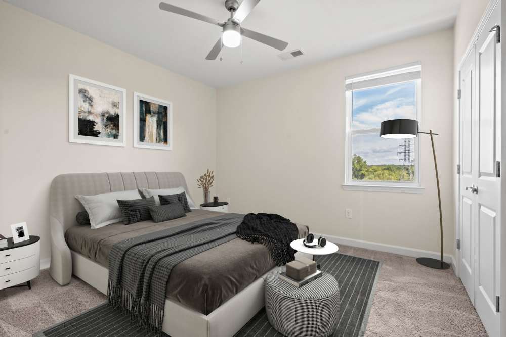 Large comfortable bed in modern bedroom at Hawks Landing in Hickory, North Carolina,