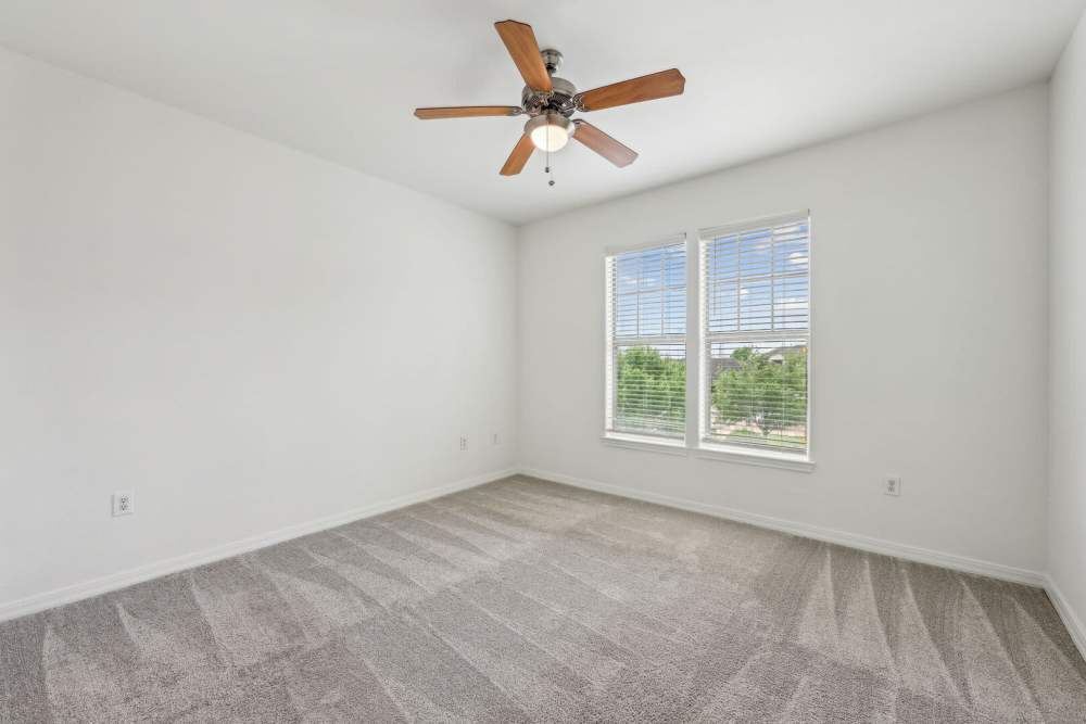 Bedroom with a ceiling fan at Barron Park in Pearland, Texas
