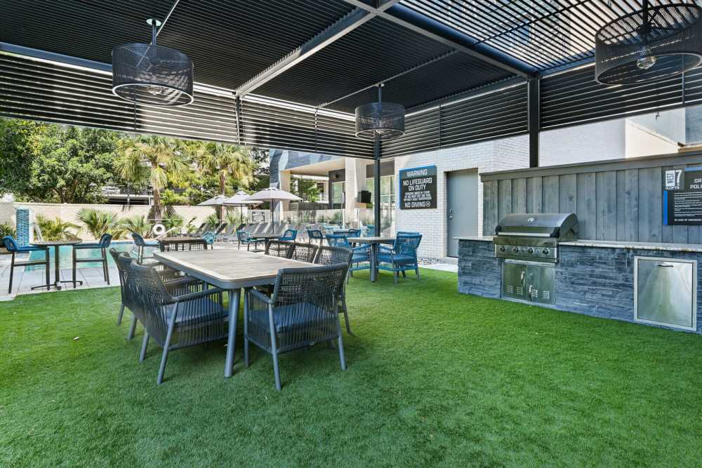 Outdoor seating area and grilling station at The Lofts At West 7th in Fort Worth,Texas