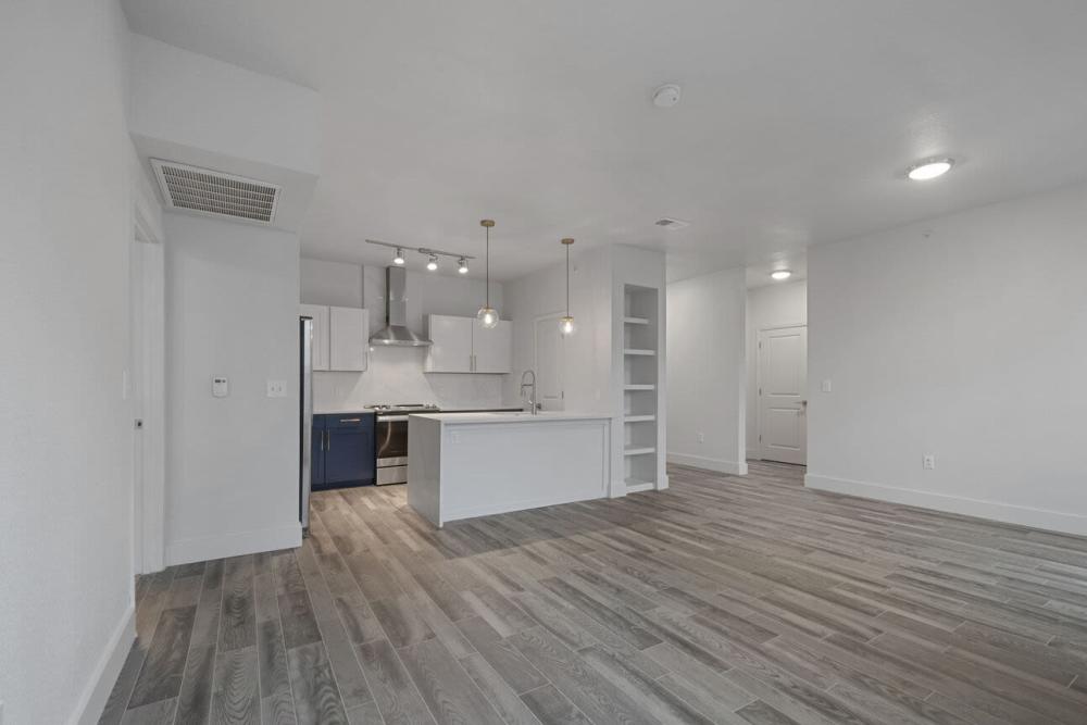 Unfurnished apartment living room with white walls at The Lofts At West 7th in Fort Worth,Texas