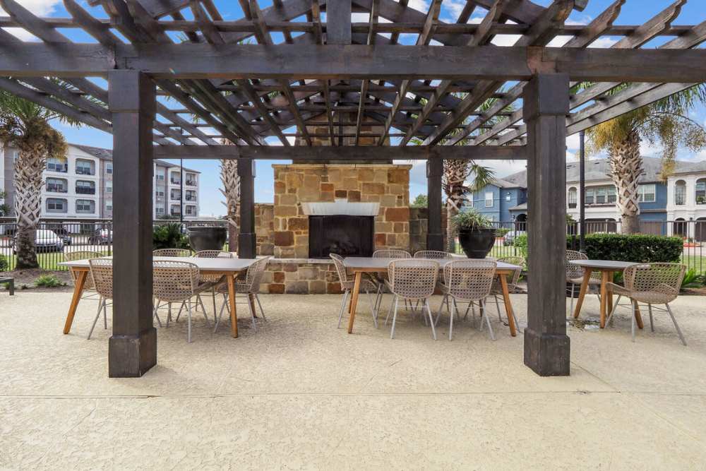 Exterior seating area with chairs at Seagrove in Conroe, Texas