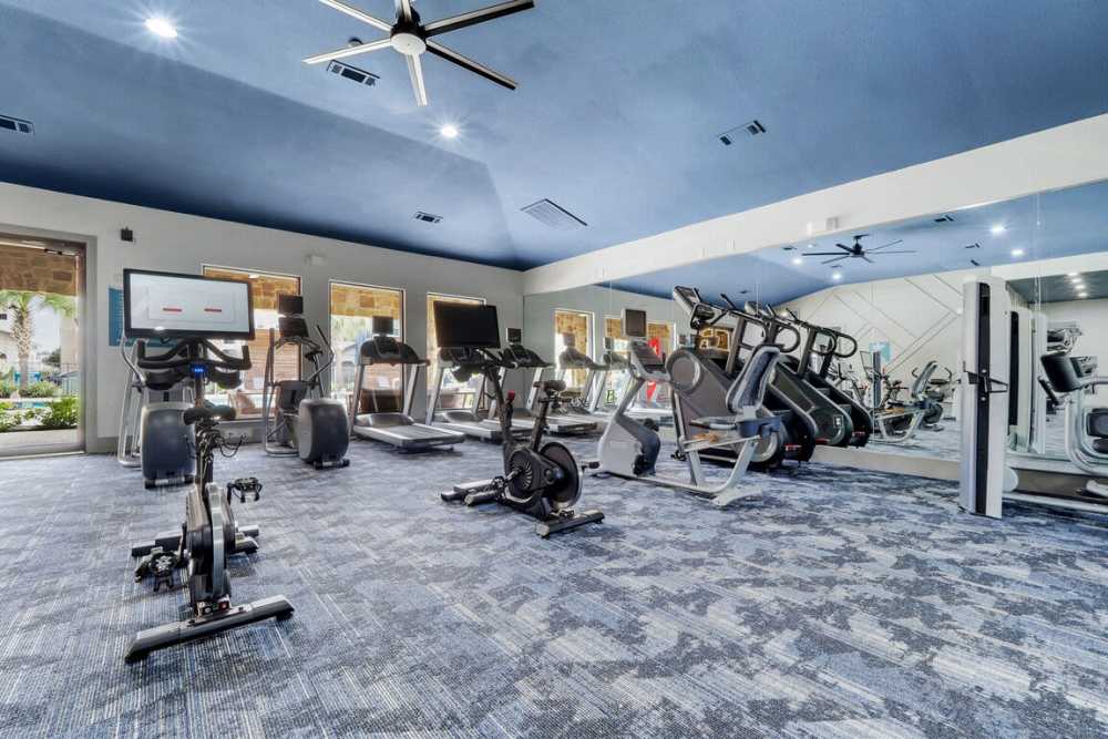 Fitness studio with ceiling fan at Seagrove in Conroe, Texas