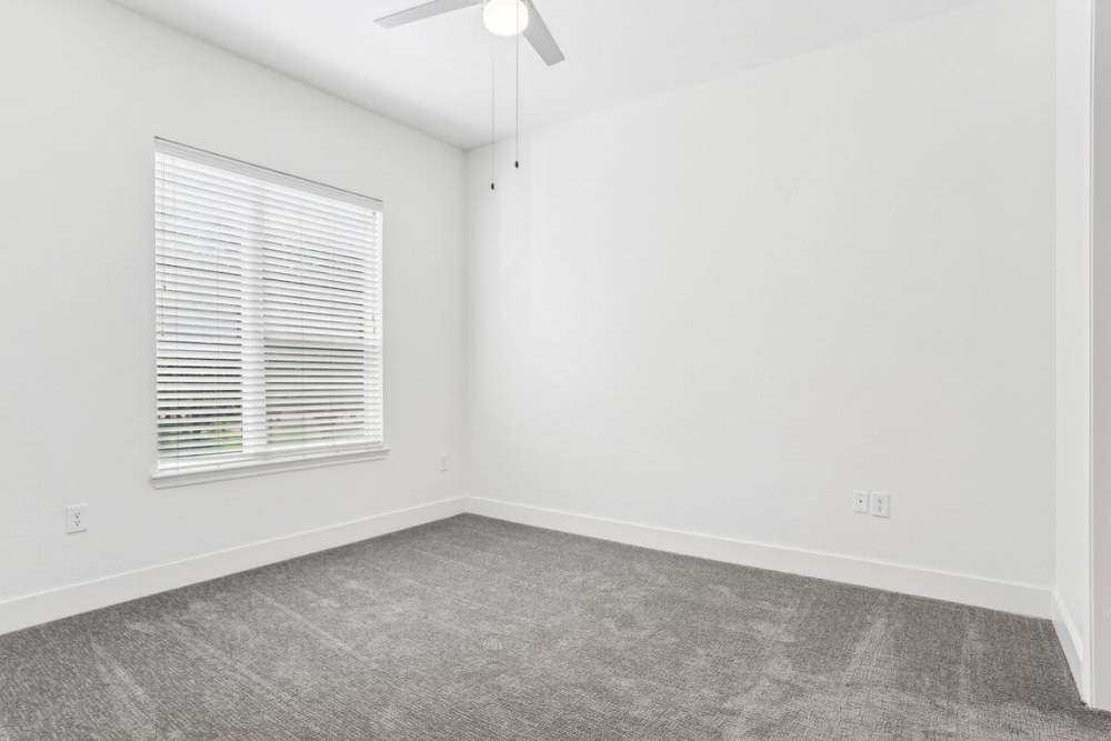 Well-lit apartment bedroom at Dorian and Encore in Plano, Texas