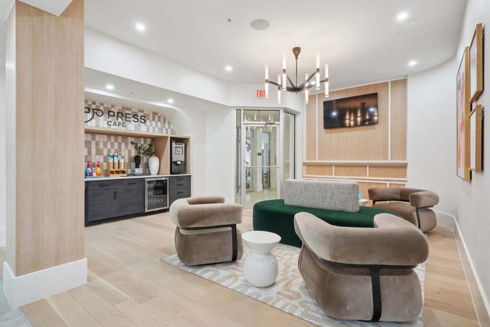 Resident lounge area with TV at Dorian and Encore in Plano, Texas