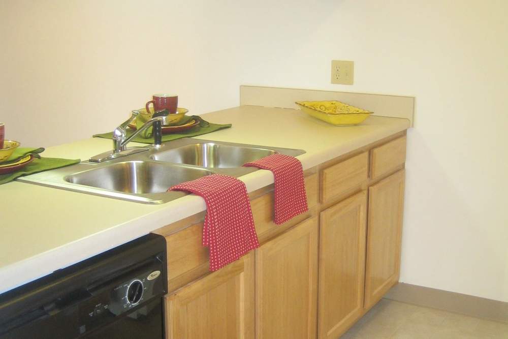 Kitchen with sink at Mayville Apartments in Mayville, Michigan