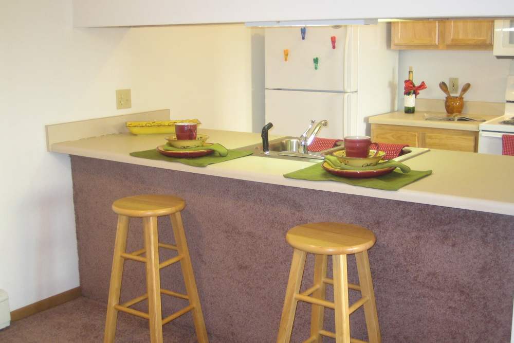 kitchen island dining table at Mayville Apartments in Mayville, Michigan
