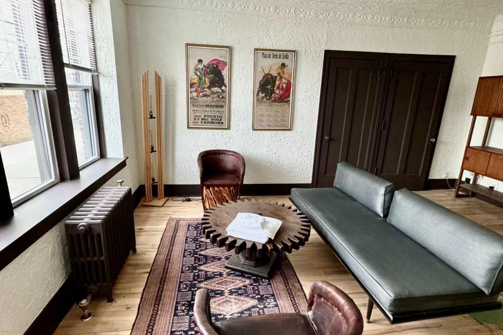 living room with wall art at Detroit Living in Detroit, Michigan