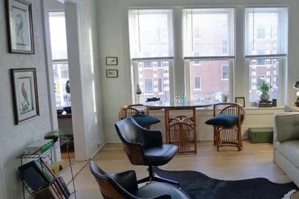Living room with wood-style flooring at Detroit Living in Detroit,Michigan