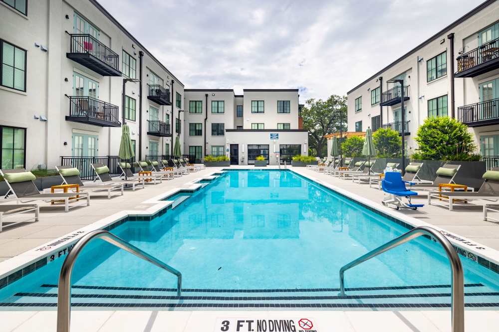 Our swimming pool and lounge chair seating at The Lowe in Savannah, Georgia