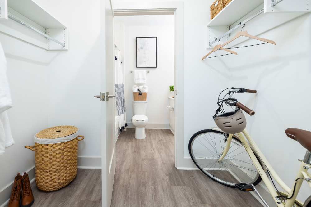 A walk-in closet leading to a bathroom at The Lowe in Savannah, Georgia
