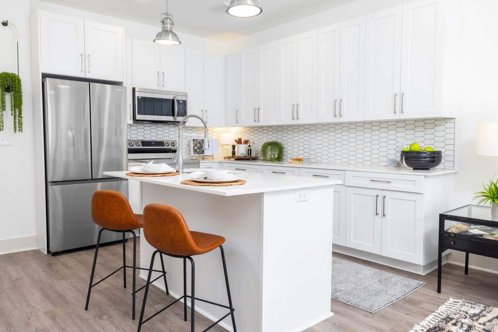 Kitchen with hardwood floors at The Lowe in Savannah, Georgia