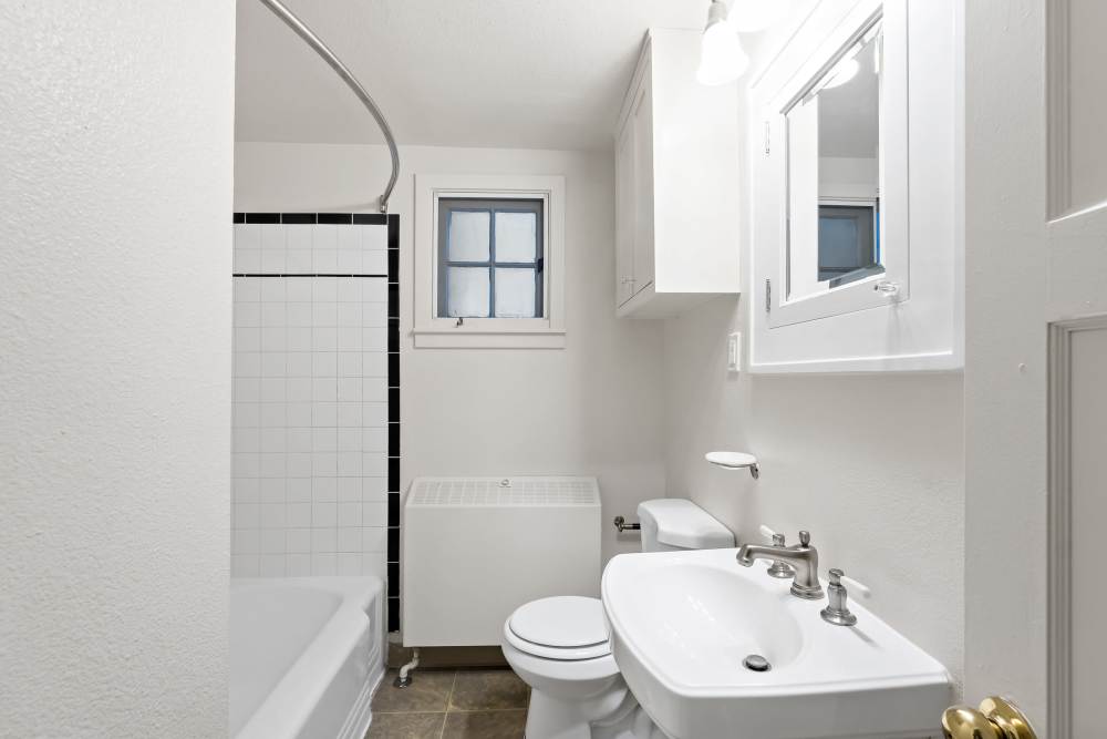 Broadmoor Community Bathroom with Tile surround