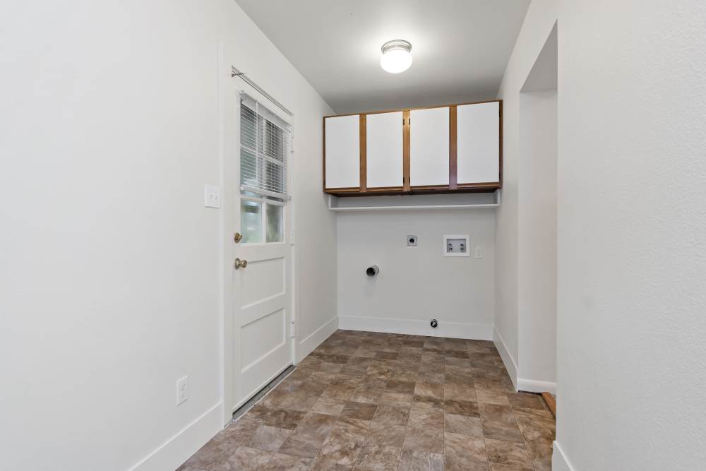 Broadmoor Community Laundry Room with Storage