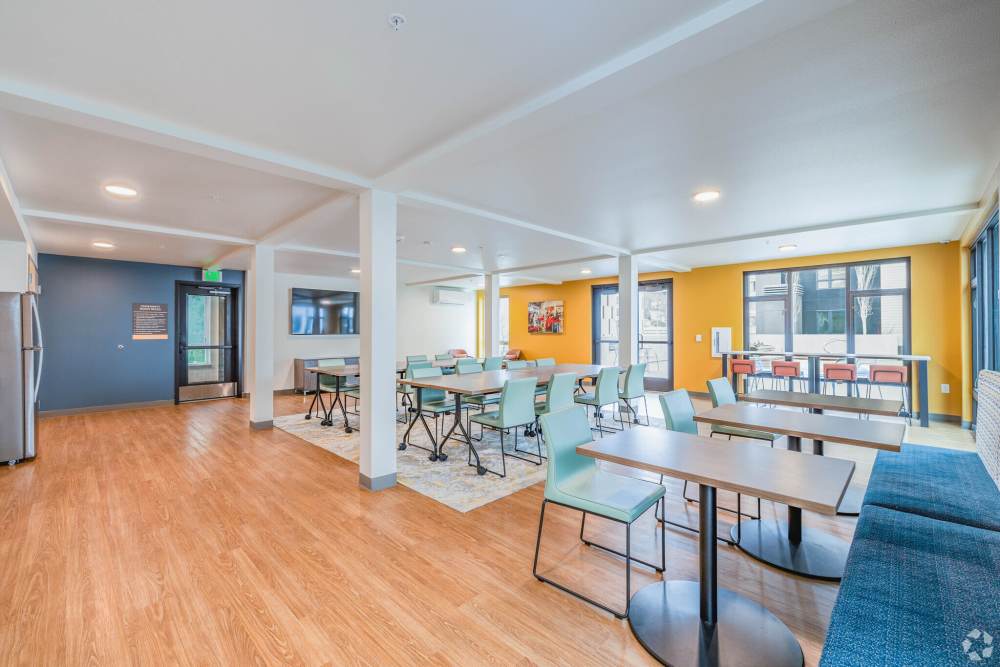 Community room with kitchenette at Tahoma Valley Apartments in Seattle, Washington