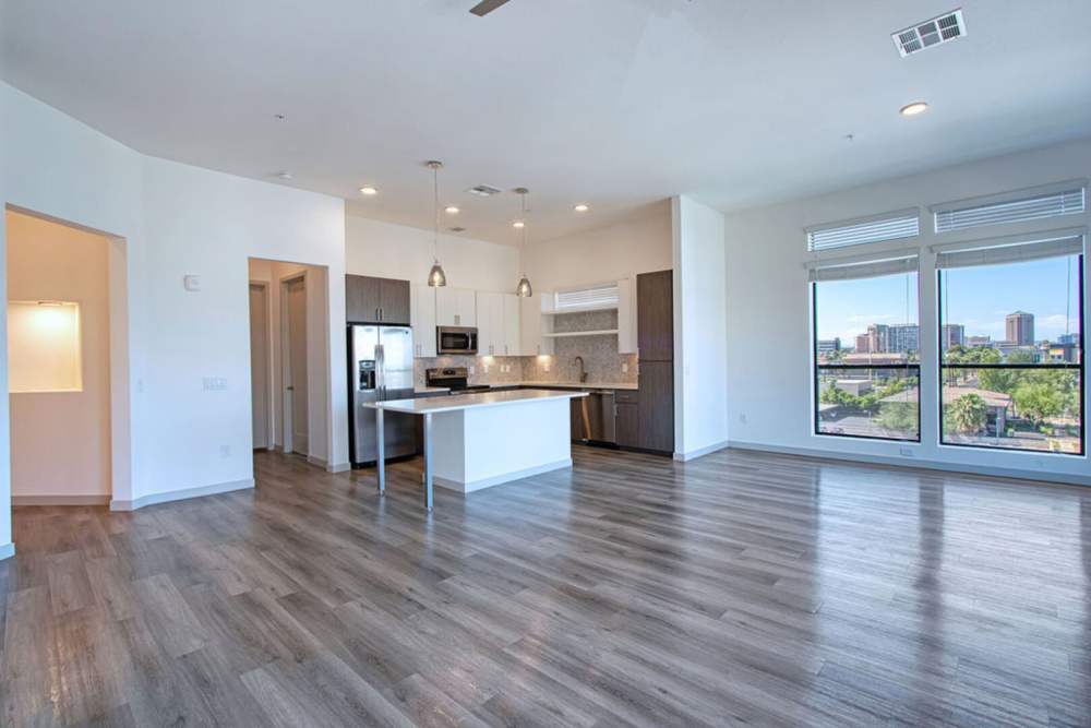 View of the kitchen from the living room at Portrait At Hance Park in Phoenix, Arizona