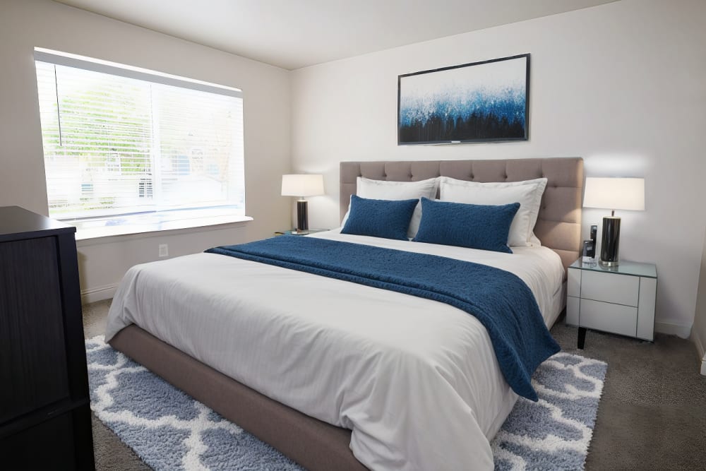 Bedroom with big windows at Oakshade Commons in Davis, California