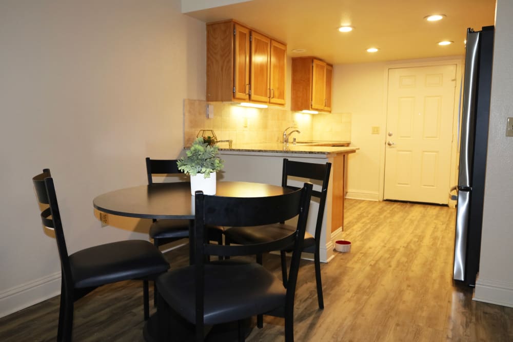Dining area and kitchen at Oakshade Commons in Davis, California