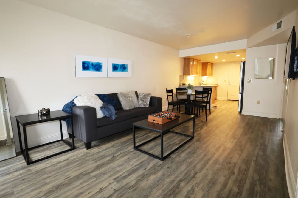Living room adjacent to the kitchen at Oakshade Commons in Davis, California
