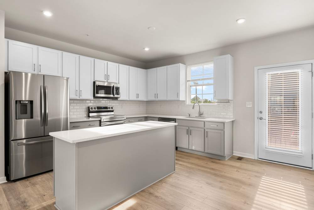 Townhome kitchen with stainless steel appliances at The Westbrook at Brewer's Row in Richmond, Virginia